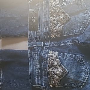Jeans. "MISS ME" brand 26 waist , 33 inseam.  Crystal encrusted back pockets.
